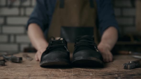 Shoemaker Makes Leather Shoes for Men Sole of Shoe Handmade Craft DIY Process Craftsman Making Boots alt