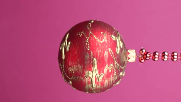 red christmas ball rotating close-up