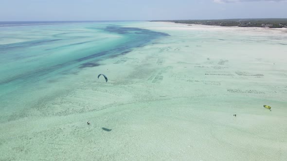 Kitesurfing Near the Shore of Zanzibar Tanzania alt