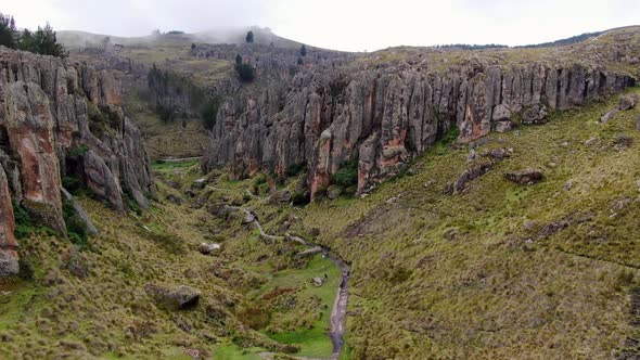 Tourist On Mountain Trails At Stone Forest In Cumbemayo, Cajamarca In Peru. Aerial Drone alt