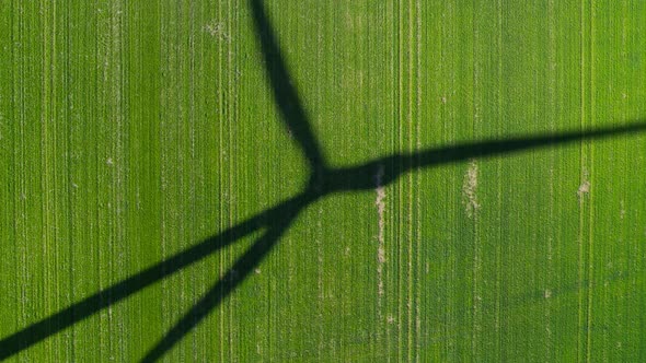 Wind Turbine Shadow On The Field 01