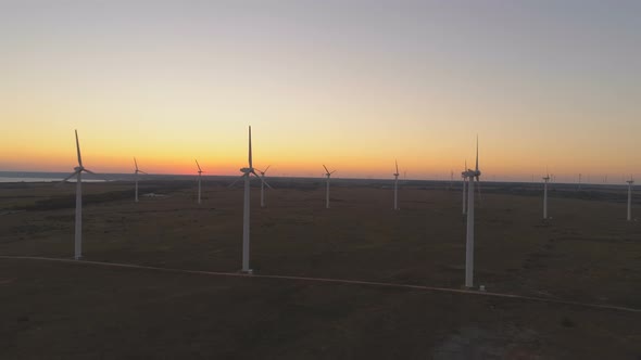 Renewable Energy Producing in Wind Farm. Green Power Eco Friendly Future Concept alt