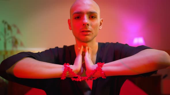 Young Caucasian Transgender Holding Hands Together Looking at Camera alt