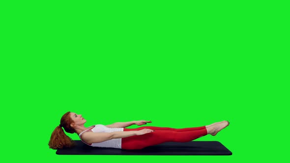 Fit Sporty Woman Doing Yoga Pose on Mat During Workout