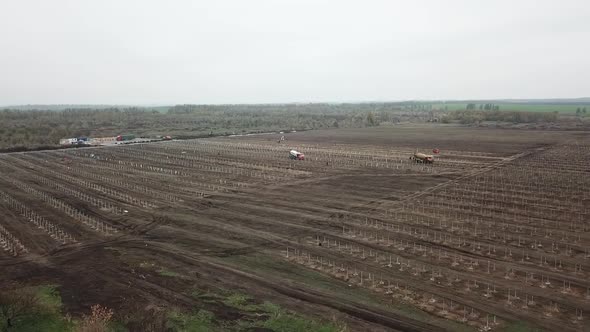 Aerial Footage of a Construction Site of a Solar Power Station in the Field alt