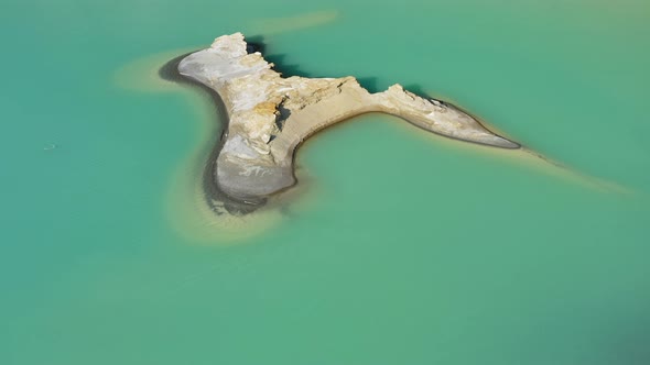 Drone View of the Turquoise Lake Formed As a Result of Mining Waste alt