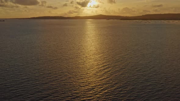 Sunset Over the Sea Drone Aerial Shot Over the Water