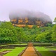 4K Lion Rock Fortress with an empty Gardens of Sigiriya on a cloudy day, Sri Lanka - VideoHive Item for Sale