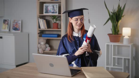 Female Graduate with Diploma in Hands Rejoices at Online University ...