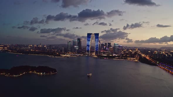 CBD buildings by Jinji Lake at night in Suzhou alt