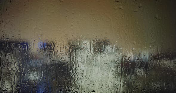 Raindrops On Glass. City In Background