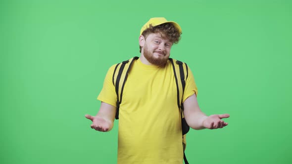 Portrait of Young Men Shrugging Sighing and Throws Up His Hands alt