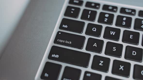 Presses Caps Lock Key