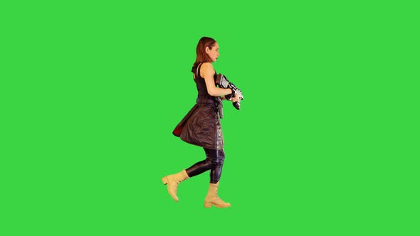 Anime Girl in Black Leather Skirt Runs with Machine Gun in Hands on a Green Screen Chroma Key