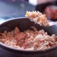 A Hand with a Fork Mixes Hot Rice with Vegetables - VideoHive Item for Sale
