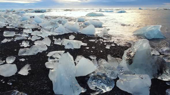 Icebergs on a Black Volcanic Beach Chunk of Ice in Iceland Arctic Landscape Winter Concept alt