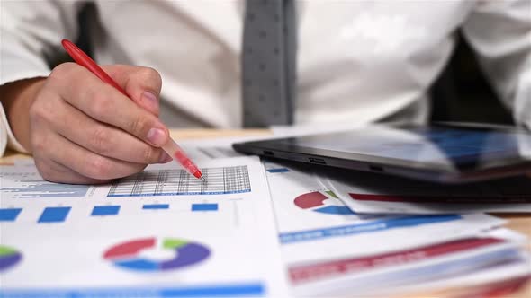 Businessman Analyzing Financial Report