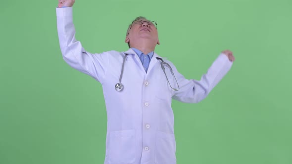 Tired Mature Japanese Man Doctor Yawning and Stretching alt