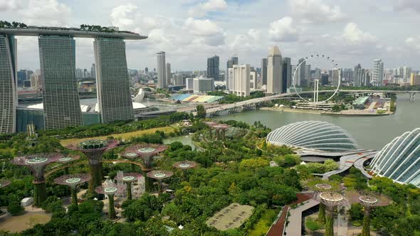 Gardens By The Bay, Flying Towards Skyline Singapore. Marina Bay In Singapore. alt