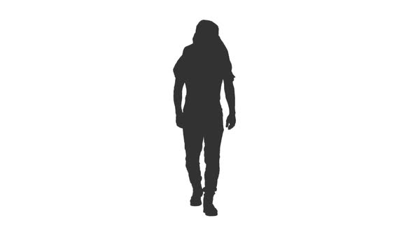 Silhouette of Walking Man with Arabic Scarf on Head