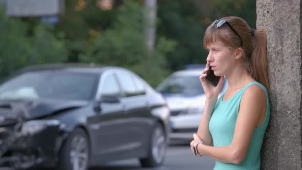 Stressed Woman Driver Talking on Mobile Phone on Street Side Calling for Emergency Service After Car alt