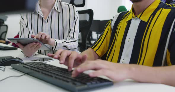 Concentrated Male Businessman Looking at Computer Monitor Working at Startup Office alt