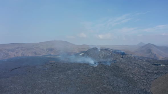 Aerial Drone Flying Above Spectacular Fagradalsfjall Volcano Landscape Fumes Release From Volcanic alt