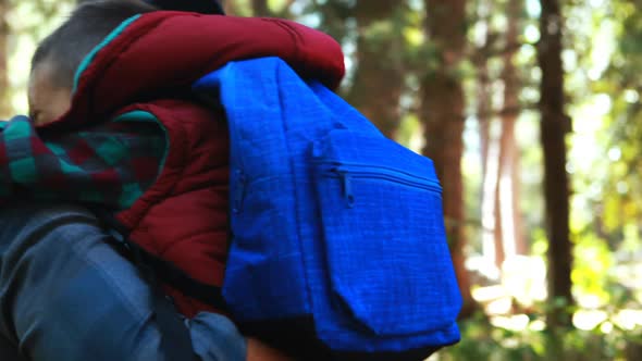 Father embracing son in the park alt