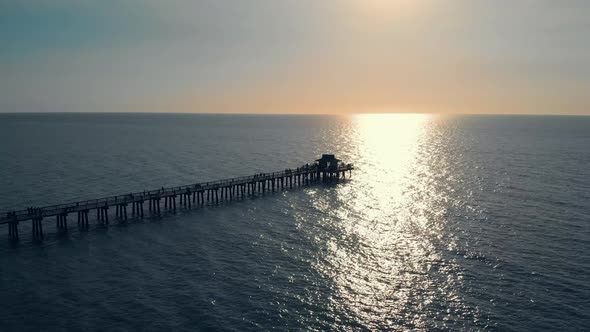 Sunset Over the Gulf of Mexico, Flying Above Pier.