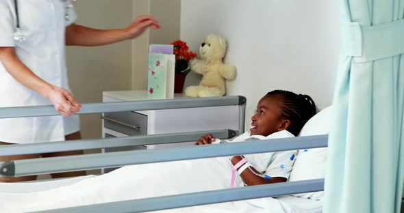 Female doctor examining a sick girl alt