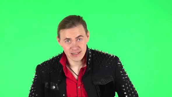 Indignant Man Negatively Waving His Head Expressing He Is Innocent. Green Screen alt