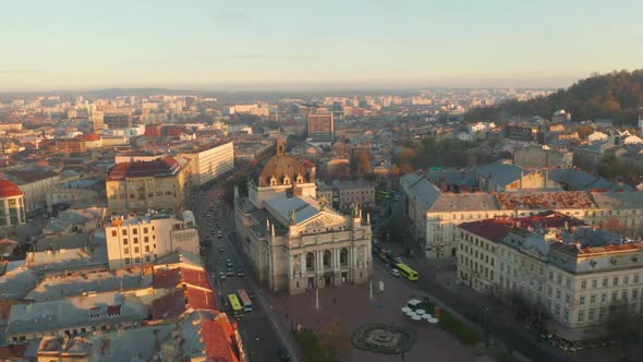 Flight Above the Roofs on Sunset, Old European City, Ukraine Lviv City alt