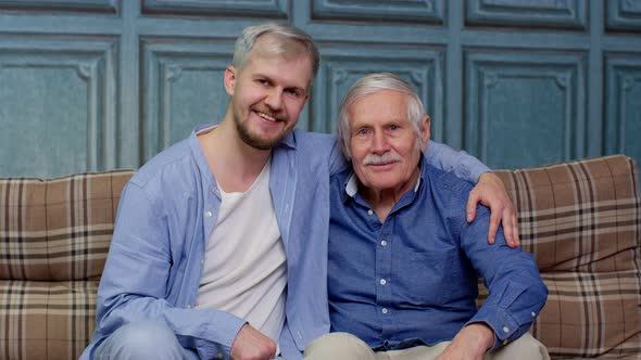 Happy Bonding Loving Different Male Generations Family of Senior Father and Adult Son or Grandson alt