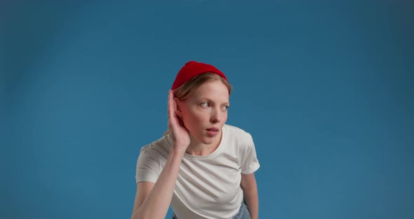 Young Female with Hearing Problems Holding Hand Near His Ear and Listening Around Carefully alt