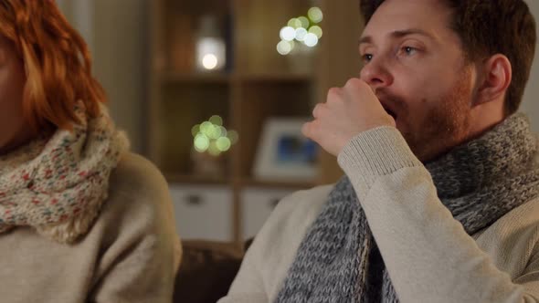 Sick Young Couple at Home in Evening alt