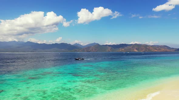 Daytime overhead abstract shot of a white sandy paradise beach and turquoise sea background alt