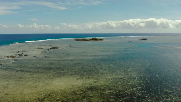 Tropical Island in the Blue Ocean Water alt