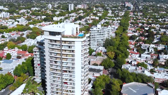 Rooftop Swimming pool Skyscrapers Apartments Andes Mendoza Argentina aerial view alt