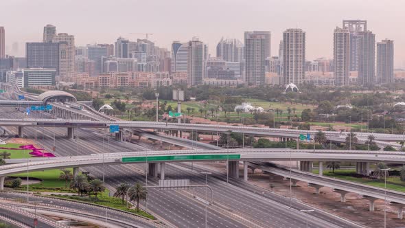 Dubai Golf Course with a Cityscape of Gereens and Tecom Districts at the Background Aerial Timelapse alt