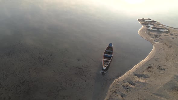 Flight Over Wooden Lonely Boat on Lake Svityaz Ukraine