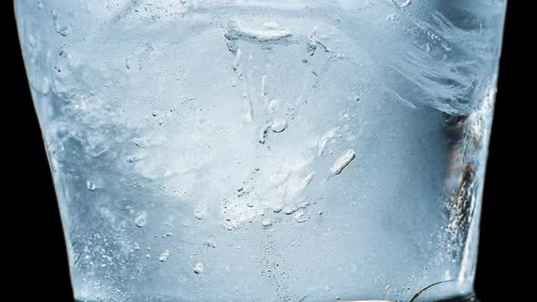 Ice Melts on a Black Background. Timelapse alt