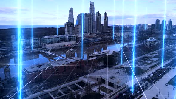 Aerial view of blue colored digital lines and grid over Port of Buenos Aires and modern Skyline in b alt