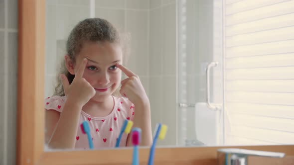 Portrait Happy Cute Young Teenage Girl Washes His Face in Bathroom and Smiling alt