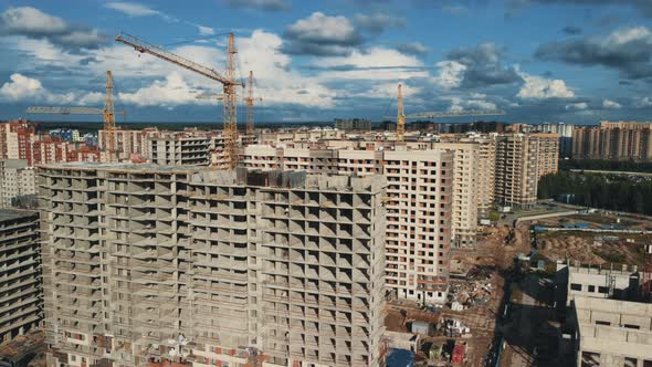 Panoramic aerial view. Construction of apartment building in green zone