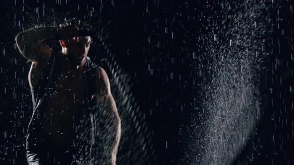 Athletic Man Working Out In The Rain alt