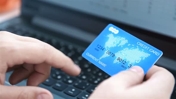 Buyer Enters Credit Card Details For Online Shopping.