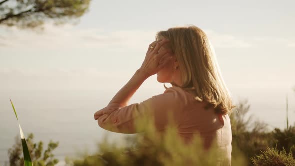 Active senior woman in forest alt