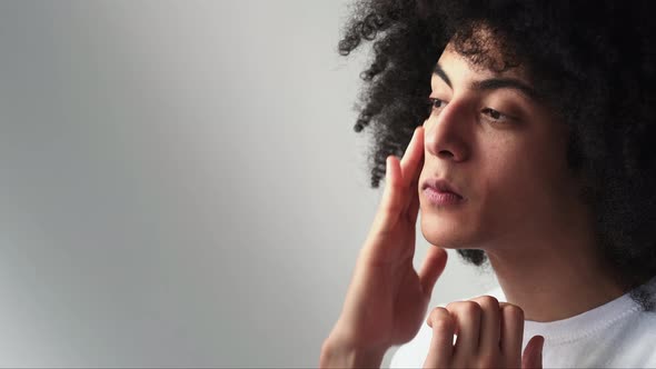 Man Skincare Facial Moisturizing Applying Cream alt