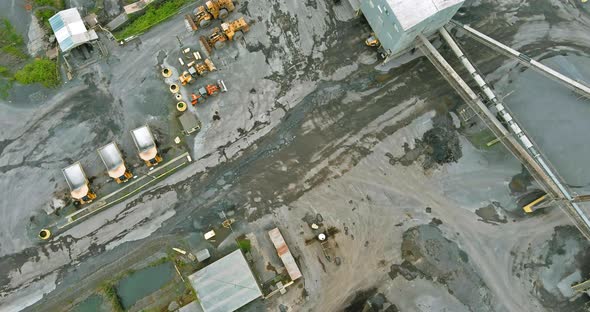 Panorama aerial view open pit mine mining, dumpers alt