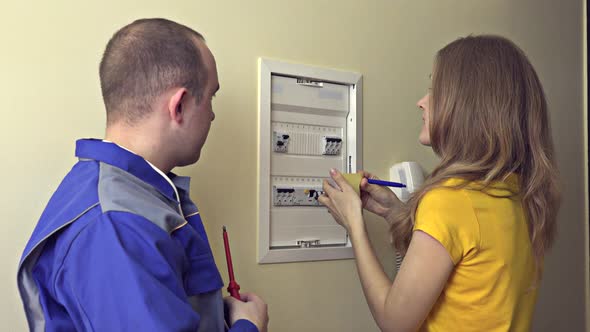 Worker Communicate with Woman Housewife to Circuit Breaker
